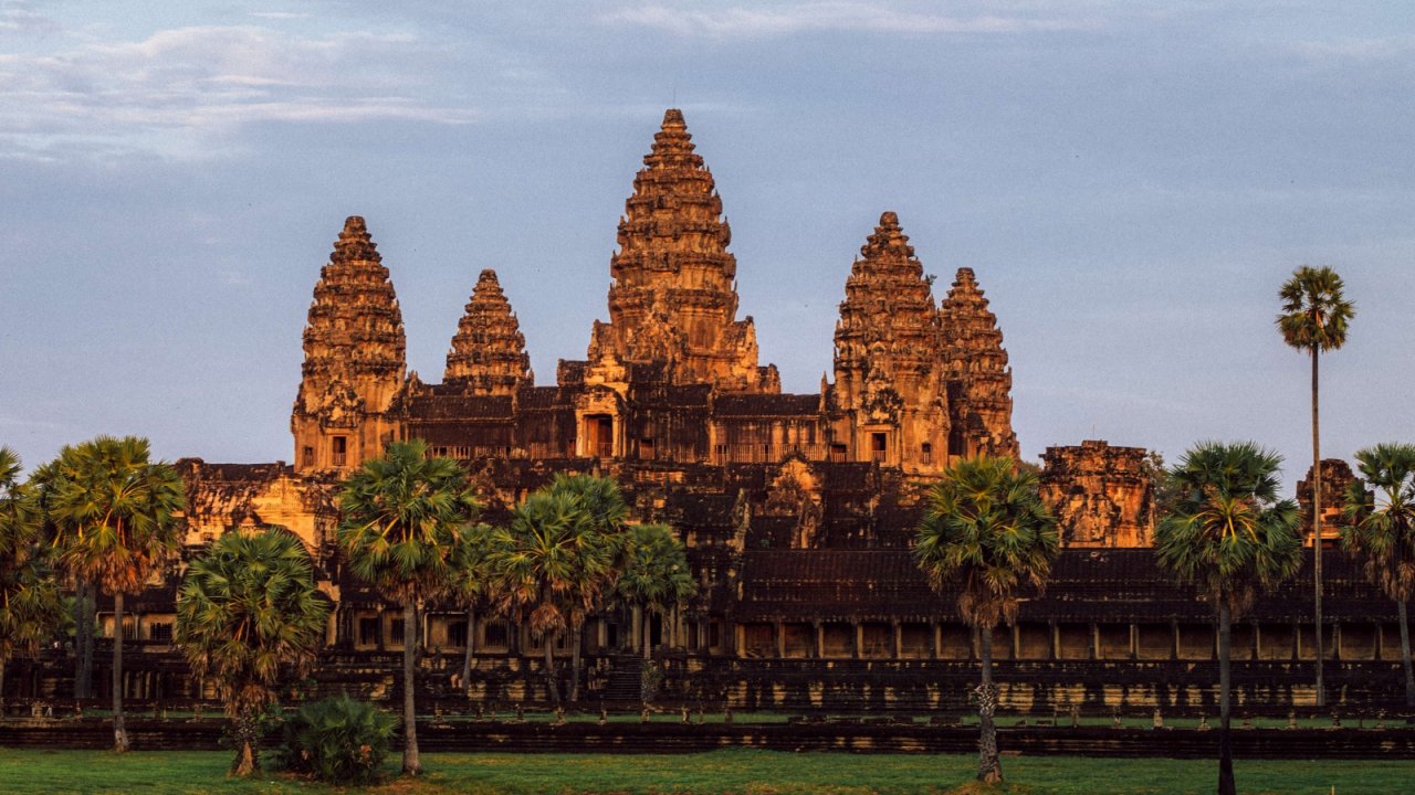 Step into the Sunrise at Angkor Wat - Capture iconic temples, walk through history, and feel the pull of mystical beauty at every corner.